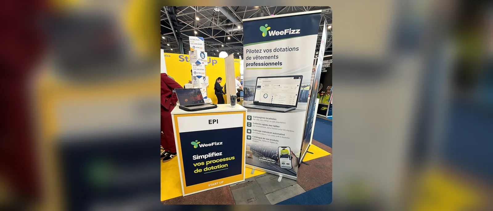 Stand WeeFizz à Preventica Lyon 2026 : comptoir EPI / Start Up avec un ordinateur portable et un kakémono WeeFizz